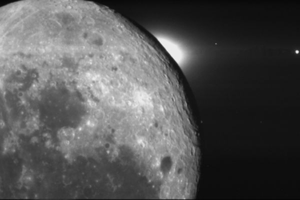 027 - Earthshine and Solar Corona over the Orientale Basin
This fantastic view of the Moon was acquired by the Attitude Determination Camera (Startracker) on board Clementine. 
The Moon is illuminated only by Earthshine - that is, sunlight reflected from the Earth to the Moon. 
The Sun is actually behind the Moon, though the outer portion of the Sun, the Solar Corona, is visible over the limb. 
The ringed basin disappearing into the darkness is the Orientale Basin.
deep shadows cast by its steep walls give a dramatic emphasis to its classic multi-ring morphology.
Parole chiave: The Moon from orbit - Clementine (Orientale Basin)