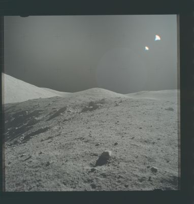 AS 17-137-21023 - Wessex Cleft, from Shorty Crater's rim
Caption NASA originale:"145:49:03 MT - Leftward of AS 17-137-21022. View along the Shorty rim toward Wessex Cleft.
Parole chiave: Lunar Panorama - Wessex Cleft