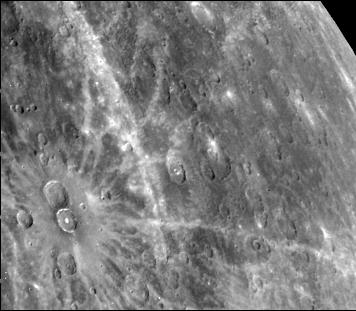Rayed Craters on Mercury
Caption NASA originale:"These two prominent rayed craters are located at 40° North and 124° West. Bright halos extend as far as 2 crater diameters beyond crater rims. Individual rays extend from halo. Bright streak extending from middle top to lower is unrelated to the two craters. Craters are 40 Km in diameter. This image (FDS 275) was taken during the spacecraft's first encounter with Mercury".
Parole chiave: Mercury