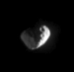 Janus (close-up)
Caption NASA originale:"This close-up view of Saturn's moon Janus shows what appear to be two large craters near the boundary between day and night. The left side of the moon is lit feebly by reflected light from Saturn. Janus is 181 Km across. 
The image was taken in visible light with the Cassini spacecraft narrow-angle camera on Feb. 18, 2005, at a distance of approximately 1,1 MKM from Janus and at a phase angle of 108°. Resolution in the original image was 7 Km (approx. 4 miles) per pixel. The image has been contrast-enhanced and magnified by a factor of three to aid visibility".
Parole chiave: Saturn's Moons - Janus
