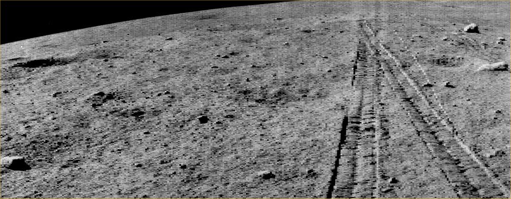 Tracks on the Moon
As with many Soviet space images, generation loss prevents us from seeing the original quality. Most Lunokhod images are derived from scanning printed images or second-generation film copies. 
Each stage of photography, printing and scanning introduces noise, nonlinear brighness mapping, and (worst of all) clamping to white or black. 
As a matter of fact, all these images only hint at the appearance of the original video signal.

Nota: oltre le tecnicalità sulla fotografia, guardate attentamente il "nido" e le "tracce" lasciate dal Rover Lunokhod-1. Eravamo nel 1970, in piena Era Apollo, lontanissimi dai giorni di Spirit ed Opportunity eppure...eppure la tecnologia di Spirit ed Opportunity c'era già: davanti a noi, in queste immagini, e sulla Luna.
Le considerazioni - inevitabili - che seguono, già le conoscete...
Parole chiave: Mare Imbrium - tracks of Soviet Lunar Rover Lunokhod-1