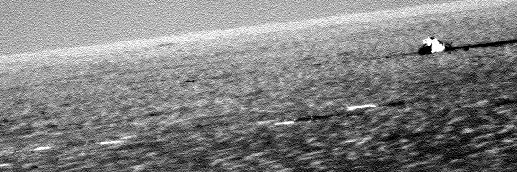 The Heat-Shield - Sol 318
Brutta immagine, ma significativa: lo Scudo Termico è a poche decine di metri da Opportunity e brilla sotto il Sole di Marte. Brilla così intensamente che le sue fattezze sono "lavate via" (washed away) dai riflessi di luce (Sun glare). Noi siamo molto interessati a questo "pezzo di metallo"; la NASA, a giudicare dalle tantissime  immagini che ha ripreso e che continua a riprendere, forse lo è anche di più...
Parole chiave: The Heat-Shield