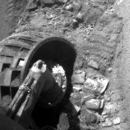 Look at my wheels!!! - Sol 838
Caption originale:"Left Front HazCam Non-linearized Sub-frame EDR acquired on Sol 838 of Opportunity's mission to Meridiani Planum at approximately 12:48:27 MLT".
Parole chiave: Martian Sands and Rover's Left Front Wheel - Meridiani Planum
