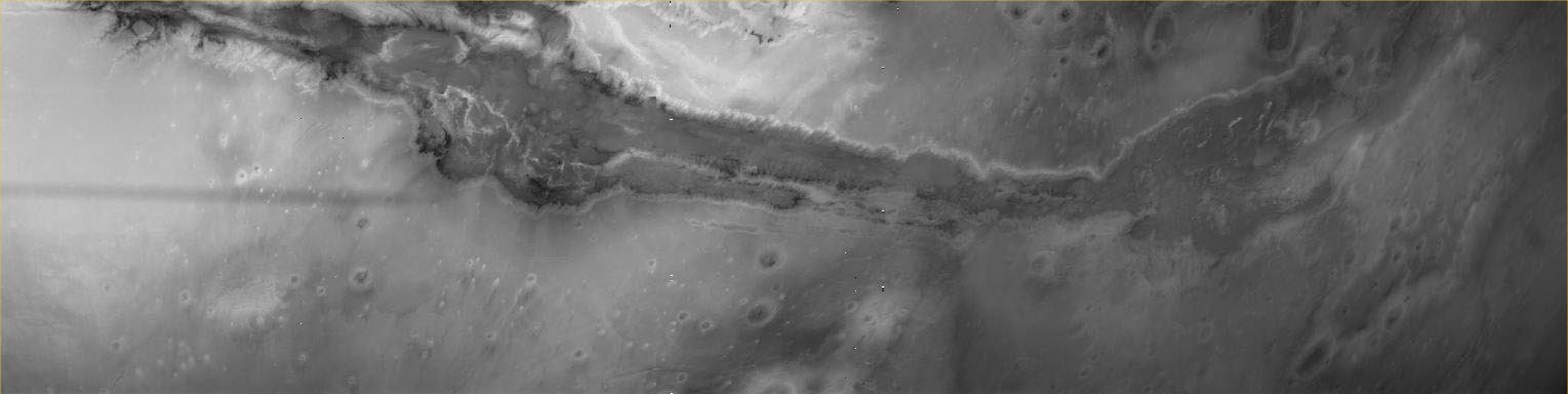 The "Strange Days" of Phobos-2: in Mars' orbit (4)
Each image includes channels 1 to 3 and a corresponding IKI processed image. Additional work was needed to correct spurious data in Channel 1 (causing the jagged misalignment of some scanlines). This may not be possible using NASA's copy of the data, which has parity bits removed. IKI performed additional processing in the frequency domain to remove periodic noise and replace bad pixels and scanlines with local median values.

White pixels appearing in columns 228-231 of the channel-3 CCD are caused by a fault in the electronics, but gained notoriety when misidentified by UFO experts as an Alien Spacecraft.
Parole chiave: Mars from orbit - Valles Marineris