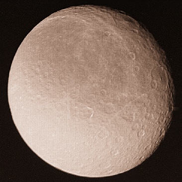 Rhea from Voyager 1
Rhea Data and Statistics
Discovered by = Giovanni Domenico Cassini  
Date of discovery = 1672  
Mass (kg) = 2.49e+21  
Mass (Earth = 1) = 4.1667e-04  
Equatorial radius = 765 Km
Equatorial radius (Earth = 1) = 1.1994e-01  
Mean density (gm/cm^3) = 1,33  
Mean distance from Saturn = 527.040 Km
Rotational period (days) = 4,517500  
Orbital period (days) = 4,517500  
Mean orbital velocity (km/sec) = 8,49  
Orbital inclination = 0,35°  
Escape velocity (km/sec) = 0,659  
Visual geometric albedo = 0,7  
Magnitude (Vo) = 9,7  
Maximum surface temperature = -174°C  
Minimum surface temperature = -220°C  
Parole chiave: Saturn's Moons - Rhea