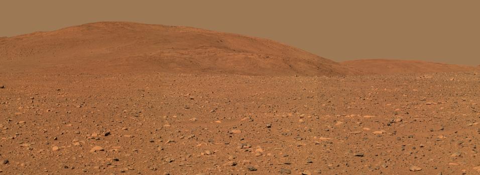 The Hills and the "Red Desert" - Sol 149 (Approx. True Colors; credits: NASA/JPL/Cornell)
Caption NASA:"This view from where NASA's Mars Exploration Rover Spirit stood on the Rover's 149th Martian Day, or Sol (such as June, 3, 2004), shows Terrain the MER has crossed since then. Spirit is currently headed East, traversing the flanks of the Hills en route to an overlook above a steep valley that is out of view from this perspective. Scientists hope to find more layered rocks that will tell a story of ancient water on Mars. Spirit has traveled 498 meters (more than one-quarter of a mile) and ascended 20 meters (66 feet) above the Plains since arriving at the "Columbia Hills" on sol 156 (June 11, 2004). It covered much of that distance driving on only five of its six wheels. 
The images used to make this approximately true-color mosaic were taken with Spirit's panoramic camera from about 300 meters (984 feet) away from the base of the hills, using filters centered at wavelengths of 600, 530 and 480 nanometers". 
Parole chiave: Postcards from Mars