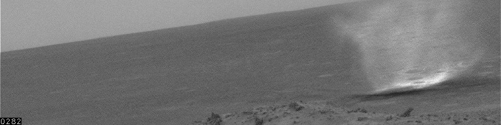 Dust Devils near Spirit on Sol 456
Caption NASA originale:"Scientists expected Dust Devils since before Spirit landed. The landing area inside Gusev Crater is filled with dark streaks left behind when Dust Devils pick dust up from an area. It is also filled with bright "hollows", which are dust-filled miniature craters. Dust covers most of the terrain. 
Winds flow into and out of Gusev Crater every day".
Parole chiave: Dust Devil