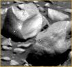 Rocky Panorama (5) detail mgnf - Sol 660
Ecco il particolare "curioso", estrapolato ed isolato dal contesto...
Parole chiave: Mars Panorama - Rocks, Outcrops and Boulders - Controversial
