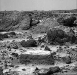 Huge rocks around Pathfinder - Sol 2
Original caption:"This image was taken on July 5 by the IMP camera. The flat, table-like rock appears to be covered with dust and it also displays many interesting linear features. 
The large rocks in the background are intriguing because of their impressive textures".
Parole chiave: Mars rocks, sand and debris