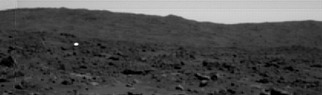 The "Silver-Sphere", near Pathfinder... - Sol 6
Ed ecco un frame che abbiamo fatto davvero fatica a trovare, ma del quale conoscevamo l'esistenza: la Backshell della Sonda Pathfinder. 
E' evidente che le fattezze di questo oggetto, tessitura superficiale e luminosità incluse, sono IDENTICHE a quelle dell'oggetto rinvenuto dal Rover Spirit a poca distanza dal Cratere Bonneville (leggete l'articolo pubblicato su TruePlanets per maggiori informazioni e dettagli). 
Mistero risolto, dunque? La Silver Sphere di Spirit è solo la sua Backshell? Apparentemente si, ma è la NASA (si, proprio la NASA!) ad ESCLUDERE questa ipotesi, collocando la Backshell di Spirit (vedi la mappa allegata all'articolo summenzionato) in un punto completamente diverso rispetto al luogo in cui le immagini che abbiamo, invece, la collocherebbero (e cioè a poche decine di metri dal rim di Bonneville Crater).

E allora? E allora, come si è detto...Il Mistero si infittisce!

Caption NASA originale:"Super-Resolution image showing the Mars Pathfinder Backshell - This image was created from 25 nearly identical frames to give one HR view of the area looking towards Big Crater. The backshell is the bright white spot at middle-left. The 2,8 mt wide and 2,1 mt high Backshell, separated from the Lander a few seconds before landing, and appears to be about 1200 mt from the Lander, to the South-South-East".
Parole chiave: Highly Controversial Frame - Soujourner/Pathfinder Series