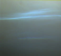 Pre-dawn clouds (3) - Sol 39
Caption NASA originale:"This true color image shows the eastern sky, 30 degrees above the horizon at 05:13 MLT on Sol 39. The bright streaks are probably ice clouds which have formed during the night. In the true colour image, the clouds appear to be blue compared to the background. This is a real effect. Unlike the red dust, the clouds are almost invisible at infrared wavelengths.
The clouds are also moving. In order to create this image, the individual, single color, data frames have had to be shifted with respect to each other. The motion indicates that the clouds are moving from the north-east to the South-West".

ATTENZIONE: questa immagine non è altro che il medesimo frame, da noi rubricato come "Pre-Dawn Clouds (1)", capovolto e con filtro/colore modificato, passando dal Rosso/Rosa/Arancio al Verde/Azzurro! Ebbene, grazie all'attenzione che poniamo nell'analisi dei frames, questa volta la NASA può solo nascondersi: li abbiamo beccati! E, se ancora non foste convinti, andate a vedere il frame che segue il quale altro non è se non la sovrapposizione dei frames (1) e (3). La NASA avrà anche i mezzi, ma sta MENTENDO SPUDORATAMENTE DA (almeno) 40 ANNI! E sapete queal'è la cosa che più ci meraviglia? Ma come abbiamo fatto a non accorgerci prima di una simile mistificazione?

Che pena, cari Amici, che pena...
Parole chiave: Martian Sky - clouds over Ares Vallis