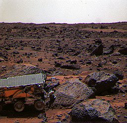 Moe and Half Dome - Sol 65 (Approx. True Colors; credits: NASA)
Caption NASA originale:"This color image shows the Soujourner Rover's Alpha Proton X-ray Spectrometer (APXS) deployed against the rock "Moe" on the morning of Sol 65. The rock behind the rover is "Half Dome", which was previously measured by the APXS. 


Parole chiave: Mars rocks, sand and debris