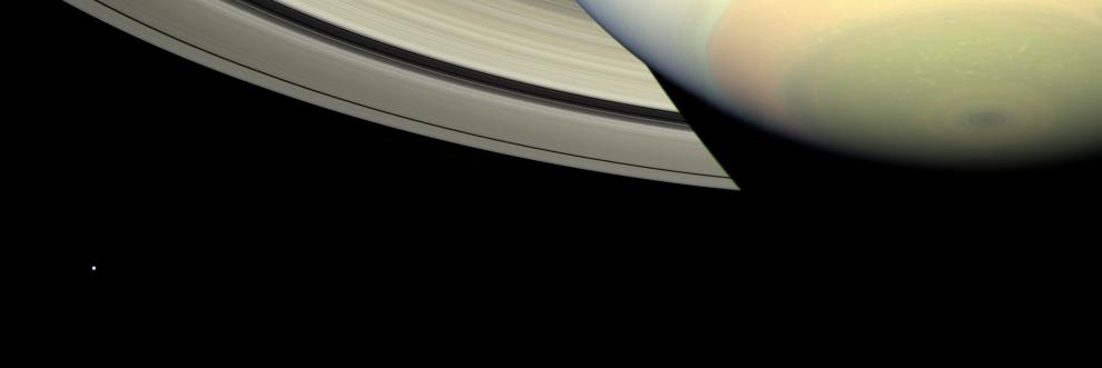 Southern Saturn
Caption NASA:"Cassini takes in a sweeping view of Saturn's South Polar Region as the planet's shadow masks the Rings and bright, icy Mimas looks on from left. 

This view looks toward the lit side of the Rings from about 28° below the Ring-Plane. 

Images taken using red, green and blue spectral filters were combined to create this color view. The view was acquired with the wide-angle camera on Feb. 20, 2007, at a distance of approximately 1 MKM (about 600.000 miles) from Saturn. 
Image scale is roughly 58 Km (about 36 miles) per pixel".
Parole chiave: Saturn and Companions