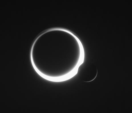 When Giants meet...
Caption NASA originale:"Saturn's two largest moons meet in the sky in a rare embrace. Smog-enshrouded Titan (5.150 Km, or 3,200 miles across) glows to the left of airless Rhea (1.528 Km, or 949 miles across). 

The image was taken in visible light with the Cassini spacecraft narrow-angle camera on June 11, 2006 at a distance of approx. 3,6 MKM (about 2,2 MMs) from Rhea and 5,3 MKM (about 3,3 MMs) from Titan. 
The Sun-Rhea-spacecraft, or phase, angle is 157° on Rhea. 
Image scale is about 22 Km (approx. 13 miles) per pixel on Rhea and 32 Km (approx. 20 miles) per pixel on Titan".
Parole chiave: Saturn's Moons - Titan and Rhea
