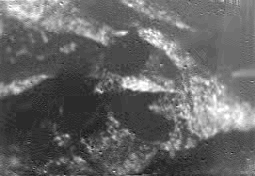 Shoreline and Drainage Channels
Caption ESA originale:"This is one of the first raw images returned by the ESA Huygens probe during its successful descent.It was taken at an altitude of 8 Km with a resolution of 20 metres per pixel. It shows what could be the landing site, with shorelines and boundaries between raised ground and flooded plains".
Parole chiave: Titan's surface
