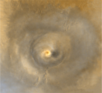 Arsia Mons and its "clouds" (1) - 19 June 2001, Ls 180� (Extremely Saturated Natural Colors; credits NASA/JPL/MSSS)
Variazioni e ripetitività climatiche osservate sulla Regione dove sorge il grande vulcano Arsia Mons.

Original caption:"A wide angle view taken by the Mars Orbiter Camera on NASA's Mars Global Surveyor. At intervals of approximately one Mars year apart, similar spiral dust clouds over a volcano named Arsia Mons can be seen. This image was taken on June 19, 2001, such as the first day of Southern Winter on Mars".
Parole chiave: Mars from orbit - Volcanoes - Arsia Mons