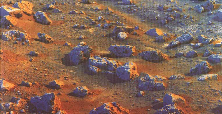 Color snap-shots from Viking 1 (10)
"...Figure (10) can best be assigned to the "Special Effects" Category. It illustrates one of the many ways in which black and white images can be combined and printed in color to yield unusual patterns. In this instance an early morning image is assigned the color yellow and a picture taken in the afternoon is assigned the color blue. Although colors produced in this way are completely false, important details in the scene are sometimes favorably accentuated..."
Parole chiave: Mars rocks, sand and debris - false colors?