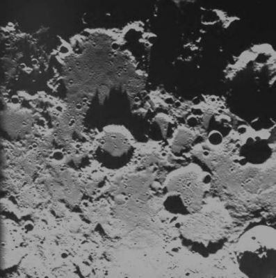 The "North Pole" of the Moon
Caption ESA originale:"This image was taken by the AMIE camera on board SMART-1 on 29 December 2004 from a distance of 5.500 Km. 
It shows an area, 275 Km across, of heavily cratered highland terrain close to the Lunar North Pole (upper left corner). 
The image is used to monitor illumination of the polar areas, and long shadows cast by large crater rims".
Parole chiave: The European Moon