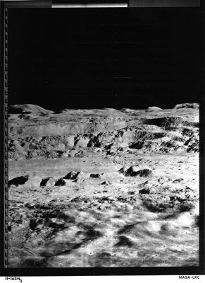 Oblique view of Copernicus Crater from Lunar Orbiter 2
Caption NASA originale:"Lunar Orbiter 2 oblique northward view of the interior of the 100 Km diameter Copernicus Crater on the Moon. The central peaks are in the middle of the image, rising about 400 m above the crater floor and stretching for about 15 Km. The northern wall of the crater is in the background. This is the top frame of a set of 3 adjoining HR frames, which are available in image lo2_h162_123 (Lunar Orbiter 2, frame 162-H3)".

Location & Time Information
Date/Time (UT): 1966-11-24 T 00:05:43
Distance/Range (km): 130
Central Latitude/Longitude (deg): +05.48/340.00
Parole chiave: Moon from orbit