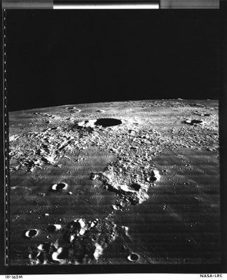 Kepler Crater from Lunar Orbiter 3
Caption NASA originale:"Lunar Orbiter 3 oblique image of Kepler crater on the Moon. The crater is 32 km in diameter and is located near the outer rim of the Imbrium Basin. Kepler is located at 8° N, 38° W, southwest of Mare Imbrium. North is at 11:00 (Lunar Orbiter 3, frame M-162)".

Location & Time Information
Date/Time (UT): 1967-02-21 T 05:02
Distance/Range (km): 156
Central Latitude/Longitude (deg): +06.91/321.90
Parole chiave: Moon from orbit