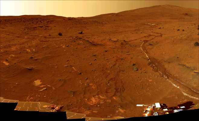 Mc Murdo Panorama (1)
Caption NASA originale:"This beautiful scene reveals a tremendous amount of detail in Spirit's surroundings. Many dark, porous-textured volcanic rocks can be seen around the Rover, including many on Low Ridge. Two rocks to the right of center, brighter and smoother-looking in this image and more reflective in infrared observations by Spirit's Miniature Thermal Emission Spectrometer, are thought to be meteorites. On the right, "Husband Hill" on the horizon, the rippled El Dorado sand dune field near the base of that hill and lighter-toned Home Plate below the dunes provide context for Spirit's travels since mid-2005. Left of center, tracks and a trench dug by Spirit's right-front wheel, which no longer rotates, have exposed bright underlying material. This bright material is evidence of sulfur-rich salty minerals in the subsurface, which may provide clues about the watery past of this part of Gusev Crater".
Parole chiave: Mars Panorama - Natural Colors