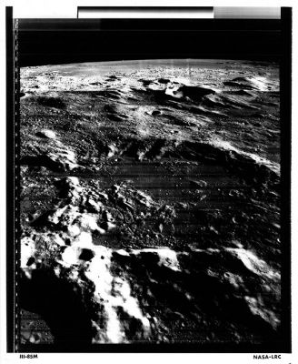 Oblique view of Murchison and Ukert Crater
Caption NASA originale:"Lunar Orbiter 3 oblique view of Murchison Crater (foreground), 58 Km across, and Ukert Crater (back right-center) on the Moon. The southern edge of Mare Vaporum is visible in the background. Note the irregular features and rilles on the floor of Murchison. North is at 10:30 (Lunar Orbiter 3, frame M-85)".

Location & Time Information
Date/Time (UT): 1967-02-18 T 04:03
Distance/Range (km): 90.4
Central Latitude/Longitude (deg): +04.94/359.66
Parole chiave: Moon from orbit