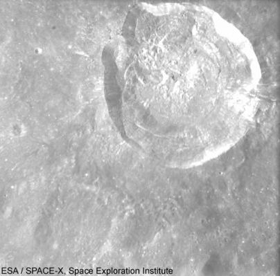 Glushko Crater
This image, taken by the Advanced Moon Micro-Imager Experiment (AMIE) on board ESA’s SMART-1 spacecraft, shows Glushko impact crater on the Moon. AMIE obtained this image from a distance of about 1600 Km, with a resolution of 150 mt per pixel. The field of view of this image is 80 Km. 
The crater is located at 8,4° North and 77,6° West and has a diameter of 43 Km. The crater is attached to the western rim of Olbers crater was previously designated 'Olbers A' before being renamed in honour of Valentin Petrovitch Glushko, a Russian rocket scientist, by the IAU. It is very close to the western limb as seen from Earth. 
This crater possesses a relatively high albedo and is the focus of a prominent ray system that extends in all directions across the nearby surface. Very clear impact features indicate that it is very young, unusual for this size of crater (compared to the 800-million year old Copernicus crater). It is possible to see a sharp impact wall and rim, unaffected by erosion (by later impacts). In the inner part of the rim, terraces and wrinkles correspond to collapsed material. 

Signatures of ejecta include a blanket surrounding the crater, but also fine radial rays. For this size of crater, the ejecta layer does not seem thick enough to swamp nearby features. In the centre of the crater, there is a rough surface, in morphological terms somewhere in between the smooth ‘bowl’ shape seen in smaller craters, and the defined central peaks in craters larger than 60 kilometres. 


Parole chiave: The Moon from SMART-1