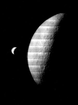 Crescent Earth and a partly illuminated far-side of the Moon from Lunar Orbiter 4
Caption NASA originale:"Lunar Orbiter 4 photograph showing a crescent Earth and partly illuminated Moon. The lunar sunset terminator is at 140° E and runs through the large dark-floored crater Tsiolkovsky, about 240 Km diameter towards the bottom of the Moon. The part of the Moon visible in this image is the western far side. North is at 1:00. The frame has been turned upside down to give the correct orientation (Lunar Orbiter 4, frame M-123)".

Location & Time Information
Date/Time (UT): 1967-05-19 T 23:27:54
Distance/Range (km): 6151
Central Latitude/Longitude (deg): +1.13/168.38
Parole chiave: Postcards from Space