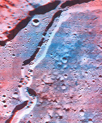 Schroteri Valley, from Lunar Orbiter 5 (3D)
Original caption:"Stereoscopic view of a part of Schroter's Valley, the meandering depression running from the upper right to the lower left corner of the anaglyph. This rille is about 7 Km wide and up to 1300 m deep. Within its flat floor is a second, sinuous rille whose tightly packed meandor loops are about 200 m deeper. The ridge that is seen in the upper left portion of the photograph is about 1600 m higher than the plateau surface into which the Valley is cut".
Parole chiave: Moon from orbit - Schroteri Valley