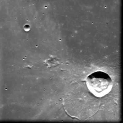 Lichtenberg Crater (HR)
An image of the prominent crater Lichtenberg with a diameter of 20 Km. The crater shows a 1300 mt height difference between crater floor and surrounding lava plain. The actual target of this observation was the 'ghost' crater on the lower left of Lichtenberg. It is almost hidden by overflown lava from Oceanus Procellarum in which it is located. This area is of high geological interest and it was selected for the study of the most recent lunar volcanism. It is thought to contain the youngest basalts on the Lunar Surface, with an age of about 1000 MY. Recent data show that lunar volcanism was active for at least 2000 MY from 4000 MY ago, ceasing at about 2000 MY. In Oceanus Procellarum, it is thought that these basalts are the youngest basalts on the lunar surface with an age of less than 1000 MY. This should be compared with the age of the Moon at about 4500 MY. This crater is named after the German physicist Georg Christoph Lichtenberg (1742-1799) who was professor at the newly formed Goettingen University.

Nota: a nostro parere, questa caption ESA è - sostanzialmente - del tutto incomprensibile ed anche errata. Nel momento in cui si sostiene, infatti, che il vulcanismo lunare è cessato da svariate centinaia di milioni di anni (o anche di più), implicitamente si dice che alcuni grandissimi Astronomi della nostra Storia, da Galileo a Flammarion (i quali hanno assistito a possibili eventi vulcanici lunari classificati come TLP nel famoso NASA Technical Report R-277), erano e sono, in realtà, dei "visionari".

Triste, come sempre; molto triste.
Parole chiave: The Moon from orbit - Craters (Lichtenberg)