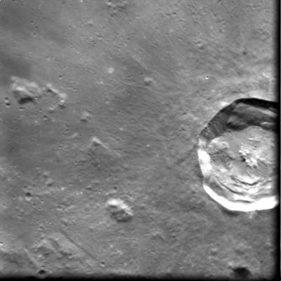 Kepler Crater
Caption ESA originale:"The imaged area is centred at a Latitude of 37,8º South and Longitude 9,0º East. Kepler is a small young crater situated between Oceanus Procellarum and Mare Insularum. It has a diameter of 32 Km and it is 2,6 Km deep. 
Kepler displays a ray system that overlaps with rays from other craters and which extends over 300 Km. 
The outer wall of Kepler shows a slightly polygonal shape. The interior walls of the crater are slumped and slightly terraced, and descend to an uneven floor and a minor central rise".
Parole chiave: The Moon from orbit - Craters - Kepler