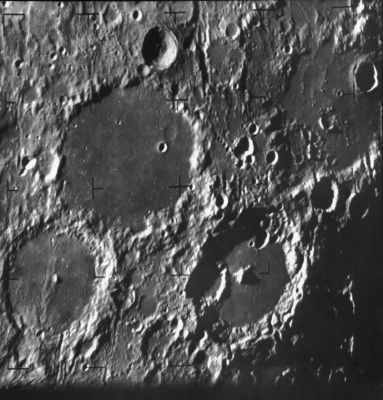 Ptolemaeus, Alphonsus and Albategnius Crater
Caption NASA originale:"Ranger 9 B-camera image from 2500 km showing Ptolemaeus, Alphonsus, and Albategnius craters. Ptolemaeus is the large (164 Km diameter) flat-floored crater at the top. Alphonsus, diameter 108 Km, is at lower left and the 114 Km Albategnius crater is at lower right. The terminator runs through the lower corner. Ranger 9 impacted in Alphonsus Crater 18,5 minutes after this image was taken. North is at 12:30 (Ranger 9, B001)".

Location & Time Information
Date/Time (UT): 1965-03-24 T 13:49:43
Distance/Range (km): 2521.74
Central Latitude/Longitude (deg): -09.52, 000.26 E 
Orbit(s): Impact - Hard Landing
Parole chiave: The Moon