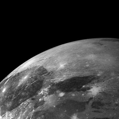 Ganymede (HR)
Caption NASA originale:"This picture of Ganymede was taken from a range of about 272.000 Km. The center of the picture lies at 13° Latitude and 359° Longitude. Many bright impact craters are shown that have radial ejecta patterns. These rays lie across and therefore are younger than the bright and dark background material. Many older impact craters are shown that have lost their rays probably by impact erosion. The bright background areas contain grooves and ridges that may be caused by faulting of the surface materials".
Parole chiave: Jupiter's Moons - Ganymede