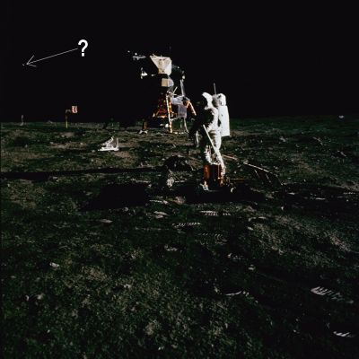 AS 11-40-5949 - Working on the Moon (HR)
Caption NASA originale:"Neil took this picture not long after taking 5948. He moved to his left between frames and this may be the moment when he goes out of the TV field-of-view. This picture gives us a good view of the split boulder that is between the two experiments. In the background, we can see the LM, the U.S. flag, and the TV camera. Note the footprints at the lower right. The astronaut who made them seems to have been moving from right to left. The rightmost footprint made with his left boot has a very deep toe imprint while the rightmost imprint made by his right boot is relatively flat and uniform. While bringing his left foot forward for the next step, he seems to have been dragging his heel, a clear indication that he was walking flat-foot, rather then hopping or running. The next left-boot toe print is deep while above it, we see that he was also scuffing his right heel along the surface. Note that the next prints made by both boots indicate that he turned to his right".
Parole chiave: Lunar Surface - ALSEP - LM - possible Anomaly