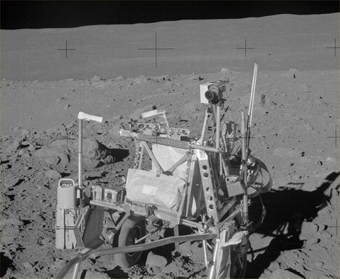 AS 14-64-9121 - Lunar Tools (HR)
Original caption:"133:23:40 MT. This frame from Al's Station C-Prime pan gives us good detail of the front of the MET, including the triangular handle brace, the 16-mm camera and the Gnomon. The dustbrush that the Astronauts use to dust themselves after each of the EVAs is hanging below the 16-mm camera on the right side of the MET. This brush is identical to the ones flown on the later missions. The white box attached to the side of the camera farthest from us is the battery pack (...)".
Parole chiave: Lunar Tools and Equipment