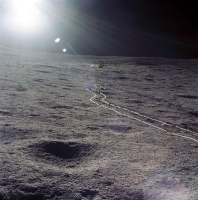 AS 14-67-9367 - The LM and the MET tires tracks
This up-Sun photo was taken from near the ALSEP Central Station back toward the LM in order to provide relative location information. As with the astronauts' bootprints, the track made by the MET tires are compact, smooth and, as can be seen so dramatically in this picture, more highly reflective than the rough undisturbed surface.
Parole chiave: Landing Site