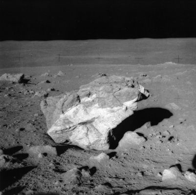 AS 14-68-9448 - VERY strange boulders
Questo frame ci mostra un macigno la cui forma bizzarra parla da sola. Che altro aggiungere?!?

Original caption:"133:40:48 MT. Close-up of a white boulder at Station C1. The LM is just above the righthand corner of the boulder (...). The large white boulder that was visible from Station C-Prime is out of the field-of-view to the right. 
Note the well-defined contact between the white rock on the bottom and a more normal gray rock on the top. 
Note, also, that we are looking at two boulders, with only the top and right edge of the background boulder visible beyond the foreground boulder. The background boulder also appears to have a contact between white and gray materials, with the lower right toe of the background boulder being white. 

In the Apollo 14 Preliminary Science Report, the foreground boulder is referred to as Contact Rock". 
Parole chiave: Moon Panorama - boulders