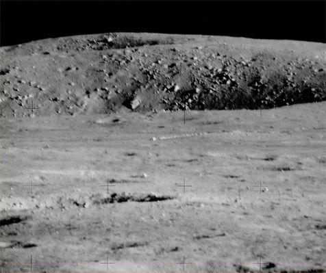 AS 15-84-11242 - Pluton and Eaglecrest Crater (HR)
Original caption:"106:56:54 MT. This first frame in Dave's 500-mm SEVA coverage of the North Complex shows Pluton Crater and, above it, Eaglecrest Crater. This is one of the few 500-mm images that Dave took without the camera being perfectly steady. By using "FocusMagic" to deblur the image it seems that a 4-pixel deblurring (next frame) along a line 50° counterclockwise from vertical worked best. 

Scan courtesy NASA Johnson".
Parole chiave: Lunar Craters - Pluton and Eaglecrest