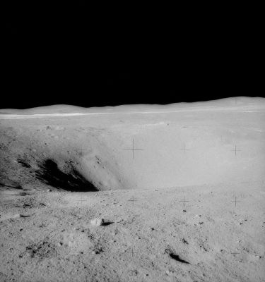 AS 16-109-17791 (HD) - Lunar Rover near Plum Crater (4)
Frame from Charlie Duke's 1st Station 1 pan. Rightward of 17790. In the distance, we can see the raised rim of South Ray Crater. Note that the rim crest to rim crest distance is about one fiducial spacing. South Ray Crater is about 700 meters in diameter and is about 5.5 Km south of their present location at Flag Crater. On the far rim of Plum Crater, note the partially buried boulder, which John and Charlie will sample after they finish their work near the Rover. 
This is the boulder that Charlie Duke mentions at 123:27:36 MCT.
Parole chiave: Moon Panorama