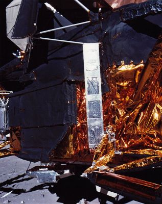 AS 16-113-18335 - Cosmic Rays Experiment
Cosmic Ray Detector mounted on the side of the LM next to the Scientific Equipment (SEQ) Bay, covered by the dark gray door. 
On the other side of the SEQ Bay, the upright fuel cask holds the plutonium fuel element for the RTG. 
Parole chiave: LM, Lunar equipment, tools and materials