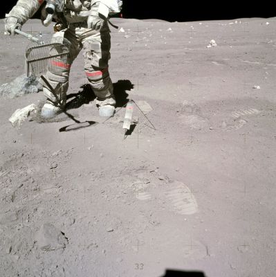 AS 16-117-18826 - Check the watch...if you can!
Down-Sun "before" of the second Station 10 Prime rake site, taken just before John started raking. In a detail, note the dirt John kicked forward as he took a step with his right foot. Most of the particles have moved out the same distance from his boot. In the wider view, note the rougher texture of the surface where John and Charlie have walked. The mortar pack with its red warning flag can be seen beyond the righthand bottom of John's PLSS while the PSE is on the other side of him, just above the rake. John's Omega watch is set on Houston time and reads 1:20 or 1:21. A transcript time of 169:27:30 corresponds to 1:21:30 on 23 April 1972. Transcript times are known to have absolute uncertainties of a minute or more, so the agreement is quite satisfactory.
Parole chiave: Postcards from the Moon