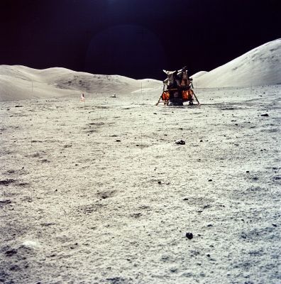 AS 17-134-20507 - Moon panorama with Lunar Module
This photo may be a locator to the LM taken by Jack Schmitt after sampling an 'exotic' on his way back to the LM from the ALSEP site at the end of EVA-3. The U.S. Flag is to the left (north) of the LM and Gene Cernan can be seen in the distance working around the Rover. 
Parole chiave: Postcards from the Moon