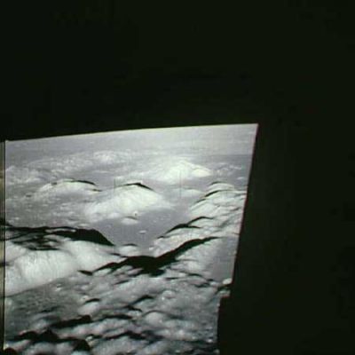 AS 17-147-22465 - CSM America or lift off from the Moon? (2)
Original caption:"Gene took this photo on the orbit before final descent. On the final approach, Gene flew Challenger down over the Sculptured Hills (low, knobbly hills in sunlight just right of frame center) and out over the valley floor before landing a little north of the Trident group of craters. The CSM with Ron Evans can be seen in the left distance with the South Massif in the background. Henry is the furthermost of the three largish craters at the foot of the North Massif to the right. The labeled version of this frame picks out a few other features for orientation. Compare this view with the CSM Pan Camera frame and note the distance across the valley from Henry to Bear Mountain and the outcrop hill beyond (in shadow here)". 
Parole chiave: Moon from orbit - Controversial