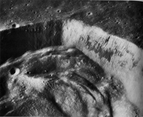AS 17-3081 - Pytheas Crater (HR)
The Apollo 17 Panoramic Camera provided this high-resolution, enlarged view of the South Wall of Pytheas. Pytheas is about the same size as Bessel, but is located in South-Central Mare Imbrium, almost 1100 km West of Bessel. 
The outcrops in the walls of the two craters are remarkably similar. 
These and the many other craters in mare areas that contain outcrops of dark horizontally layered rock demonstrate the moonwide uniformity of conditions in the upper part of the mare basins.
Parole chiave: The Moon from orbit - Craters - Pytheas