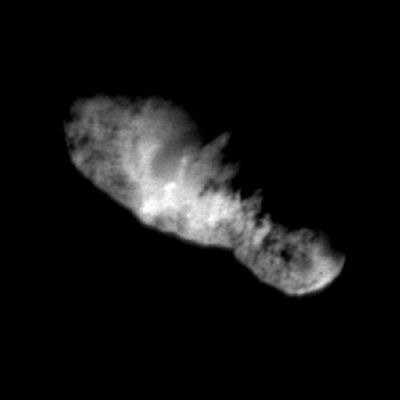 The "Borrelly" Comet from Deep Space 1
In this highest resolution view of the icy, rocky nucleus of comet Borrelly, (about 45 meters or 150 feet per pixel) a variety of terrains and surface textures, mountains and fault structures, and darkened material are visible over the nucleus's surface. This was the final image of the nucleus of comet Borrelly, taken just 160 seconds before Deep Space1's closest approach to it. This image shows the 8-km (5-mile) long nucleus about 3417 kilometers (over 2,000 miles) away.
Smooth, rolling plains containing brighter regions are present in the middle of the nucleus and seem to be the source of dust jets seen in the coma. The rugged land found at both ends of the nucleus has many high ridges along the jagged line between day and night on the comet. This rough terrain contains very dark patches that appear to be elevated compared to surrounding areas. In some places the dark material accentuates grooves and apparent faults.
Parole chiave: Comets: images from Space