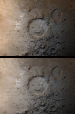 Galle Crater (Natural Colors; credits: NASA/MGS/MSSS)
Caption NASA originale:"The 2 pictures shown here are taken from the same daily global image mosaic (the only difference is that each was processed slightly differently). The pictures show Galle Crater, informally known as "Happy Face," as it appeared in early Southern Winter. The white-ish gray surfaces are coated with wintertime carbon dioxide frost. The pattern of frost distribution gives the appearance that "Happy Face" has opened its mouth. Galle Crater is located on the east rim of Argyre Planitia at 51°S, 31°W. Sunlight illuminates the scene from the upper left. Galle Crater is about 230 Km (143 mi) across".
Parole chiave: Mars from orbit