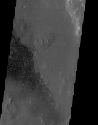 Black Dunes inside Holden Crater
Caption NASA originale:"A common location for dune fields on Mars is in the basin of large craters. This dune field is located in Holden Crater at 25° South Latitude". 

Image information: VIS instrument; 
Latitude 25,5° South; 
Longitude 326,8° East (such as 33,2° West);
Resolution: 19 meter/pixel.
Parole chiave: Mars from orbit - Craters and Dunes
