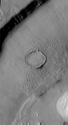 Almost Buried Unnamed Crater in Deuteronilus Mensae (Original NASA/JPL/ASU b/w Frame)
Caption NASA originale:"This Unnamed Crater appears to be in the process of being covered over by downslope movement of material. These large slopes of material are common in Deuteronilus Mensae". 

Image information: VIS instrument;
Latitude: 41,1° North;
Longitude: 17,8° East;
Resolution: 19 meter/pixel.
Parole chiave: Mars from orbit - Craters - Almost Buried Unnamed Crater in Deuteronilus Mensae