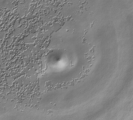 Filled and Buried Unnamed Crater in the South Polar Region (Original NASA/MGS/MSSS b/ Frame)
Original caption:"This MGS-MOC image shows a Circular Depression and a suite of eroding Mesas of CO2 - features occuring in the South Polar Residual Cap of Mars. The eroding CO2 creates landforms reminiscent of 'Swiss Cheese'. The Circular Feature might indicate the location of a filled, Buried Impact Crater". 

Location near: 86,8° South Lat. and 111,0° West Long.
Image width: width: ~3 Km (~1,9 mi) 
Illumination from: upper left 
Season: Southern Spring
Parole chiave: Mars from orbit - Craters - Unnamed Crater in the South Polar Regions