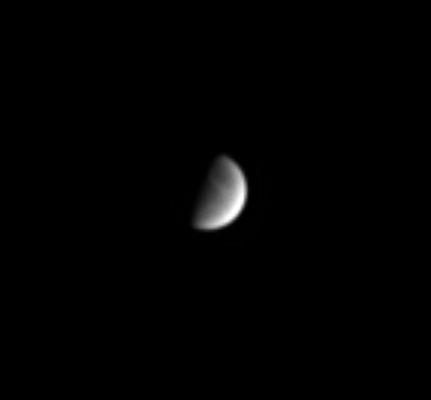 Dione
Caption originale NASA: "Dione shows Cassini some of the bright wispy streaks that cover much of the moon's trailing hemisphere. The streaks are thought to be deposits of icy material that has been extruded onto the moon's surface from the interior. Dione's diameter is 1.118 Km across. 
The image was taken in visible light with the Cassini spacecraft narrow angle camera on Sept. 28, 2004, at a distance of 7.3 MKMs from Dione and at a Sun-Dione-spacecraft, or phase, angle of 79°. The image scale is 44 Km per pixel. The image has been magnified by a factor of four to aid visibility".
Parole chiave: Saturn's Moons - Dione